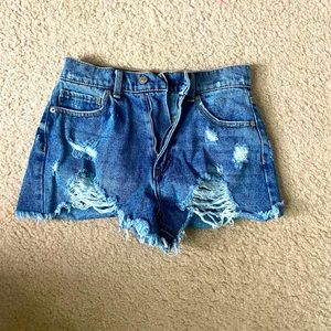 Distressed denim shorts